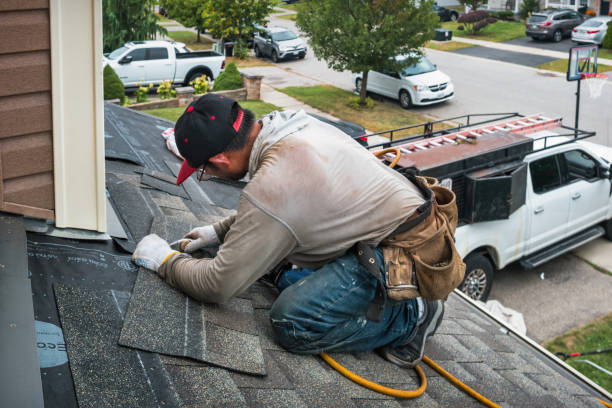 Professional Roofing technician working in Stoughton, MA
